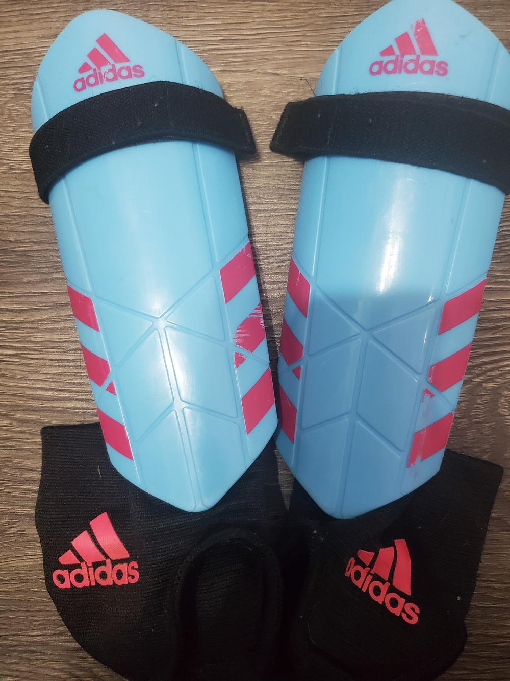 adidas Light Blue and Pink Youth Soccer Shin Guards with Black Sleeves